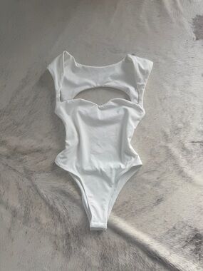 Brand new fitted cutout bodysuit